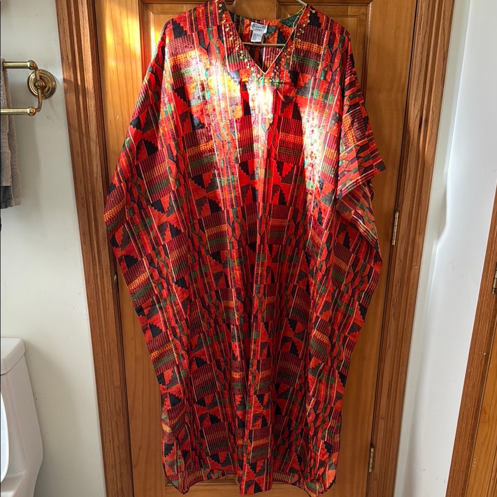 Red and Green Satin Cape Dress with Intricate Patterns